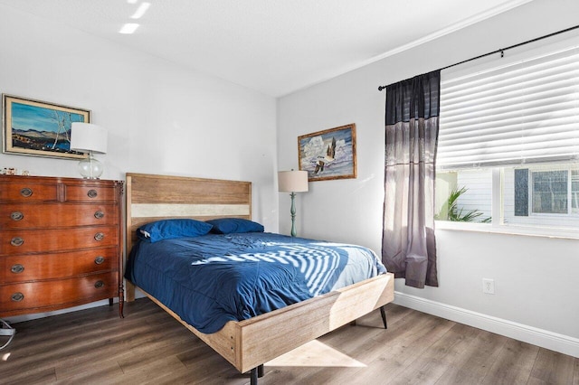 bedroom featuring hardwood / wood-style floors