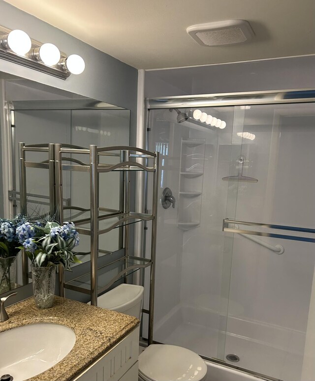 4731 Sable Pine Cir Unit A1, West Palm Beach, FL 33417 - bathroom with an enclosed shower, toilet, and vanity