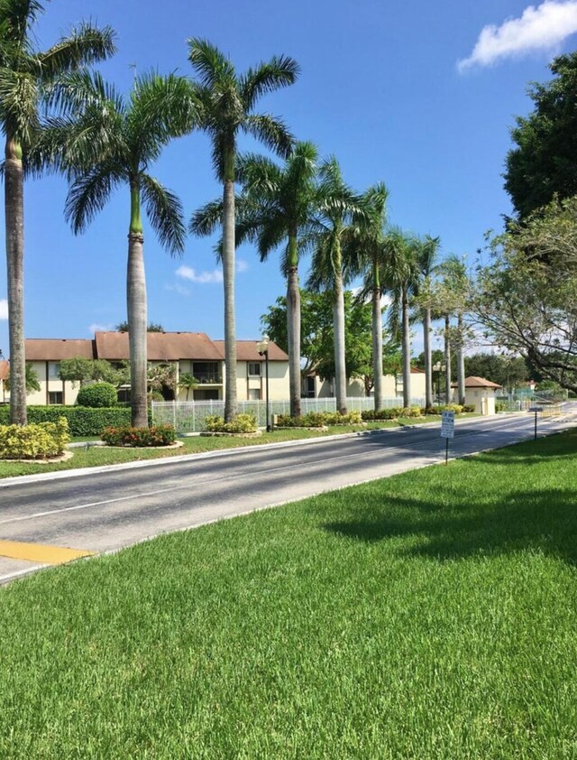 4731 Sable Pine Cir Unit A1, West Palm Beach, FL 33417 - view of tennis court featuring community basketball court and fence