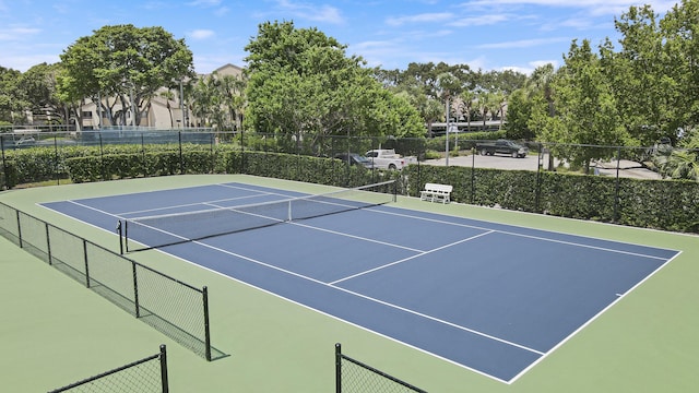 view of sport court with basketball hoop