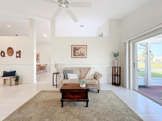 living room featuring ceiling fan and light tile patterned flooring