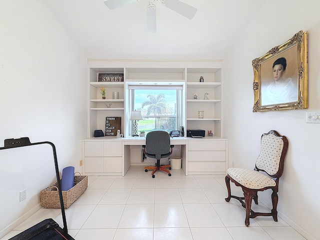 office area featuring built in desk, built in features, ceiling fan, and light tile patterned flooring