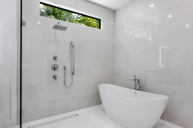 bathroom with independent shower and bath