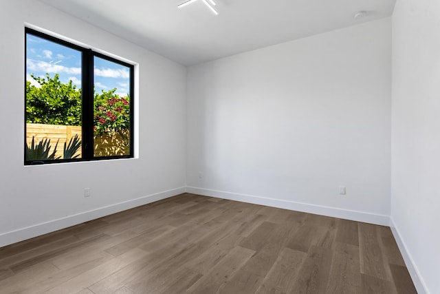 spare room featuring light wood-type flooring