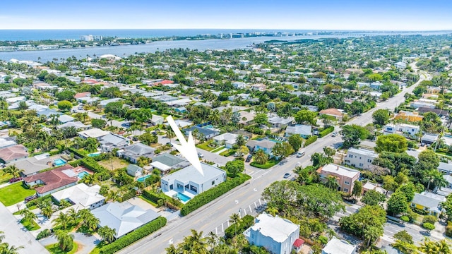 drone / aerial view featuring a water view