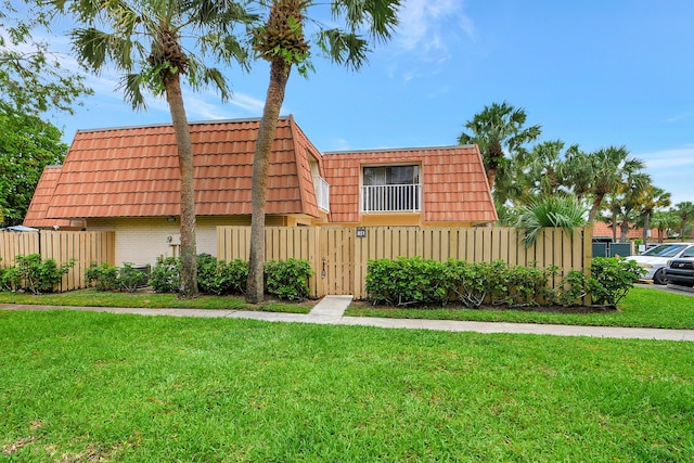 view of front of house with a front yard