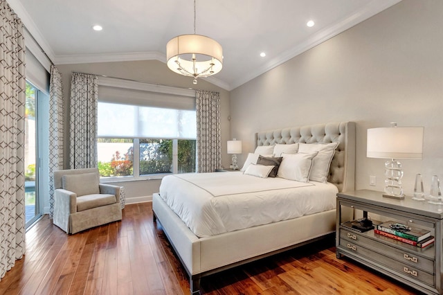 bedroom featuring wood-type flooring, crown molding, and lofted ceiling