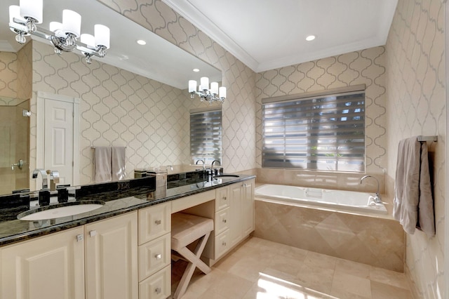 bathroom featuring tile patterned floors, crown molding, vanity, and a relaxing tiled tub