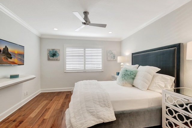 bedroom featuring wood-type flooring, ceiling fan, and crown molding