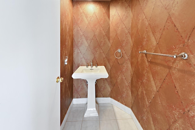 bathroom with tile patterned floors