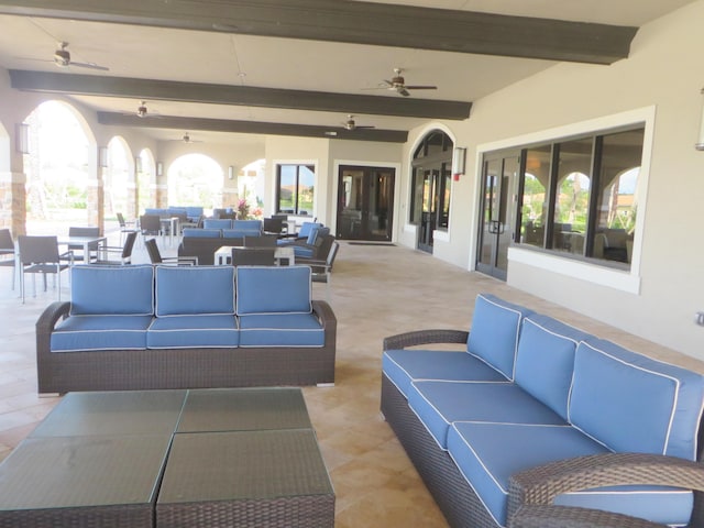 view of patio / terrace with ceiling fan and outdoor lounge area