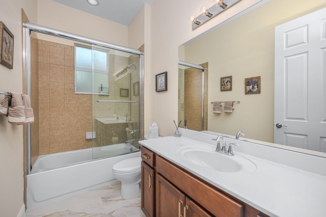 full bathroom featuring toilet, enclosed tub / shower combo, and vanity