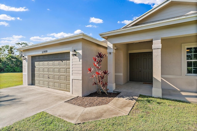 property entrance with a lawn