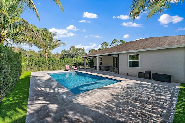 view of pool featuring a patio area