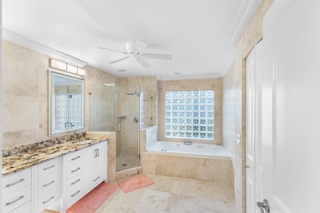 bathroom featuring tile walls, ceiling fan, vanity, and independent shower and bath