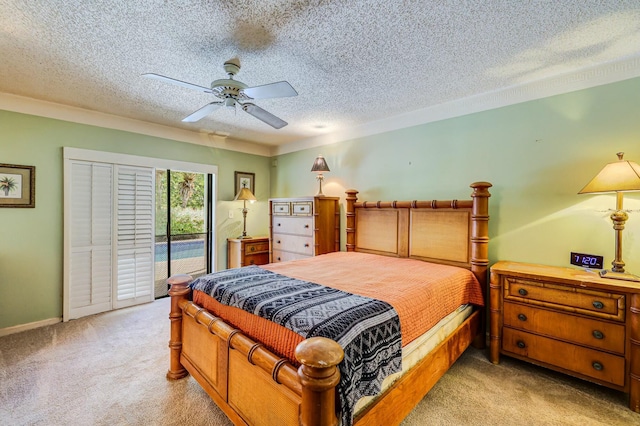 bedroom with access to exterior, ceiling fan, light carpet, and a textured ceiling