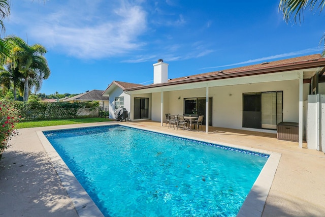 view of pool with a patio area