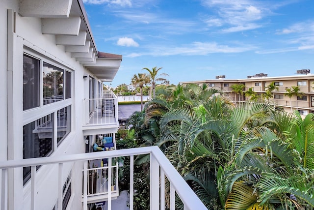 balcony featuring a water view