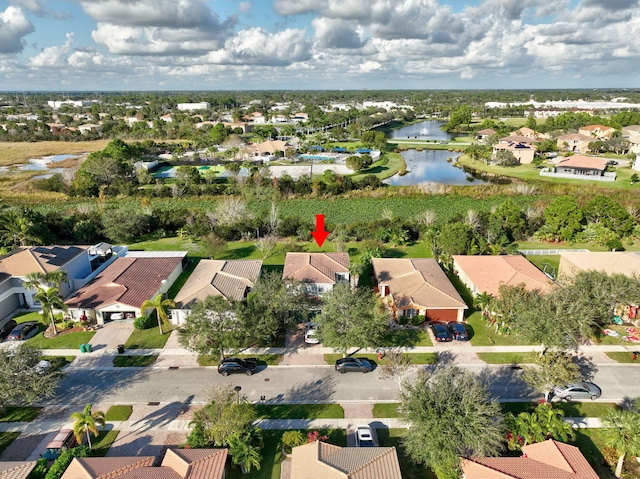 drone / aerial view featuring a water view