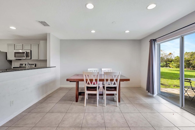 view of tiled dining area