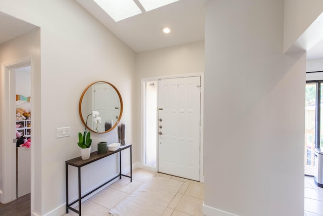 foyer entrance featuring light tile patterned floors