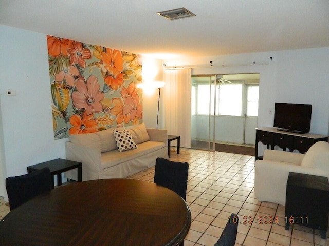 living room featuring light tile patterned floors