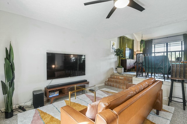 living room featuring ceiling fan