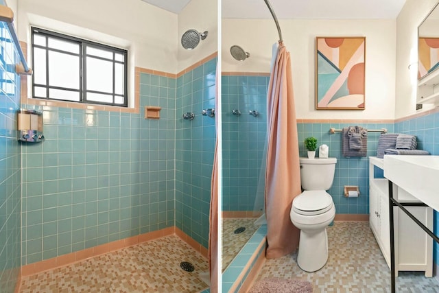 bathroom with tile patterned floors, a shower with curtain, tile walls, and toilet