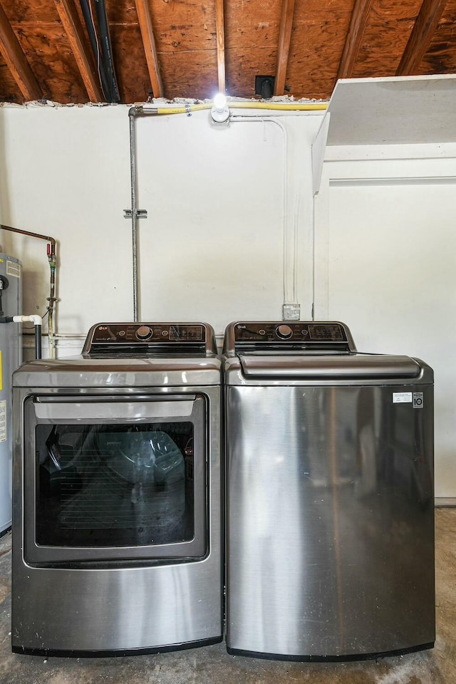 washroom featuring washer and dryer