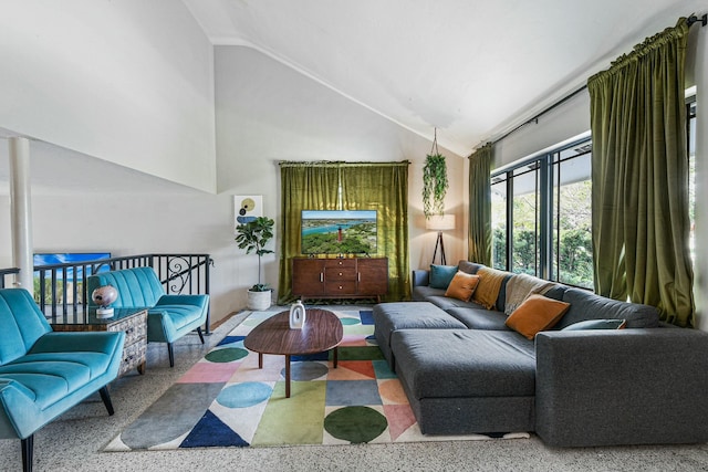 living room with vaulted ceiling