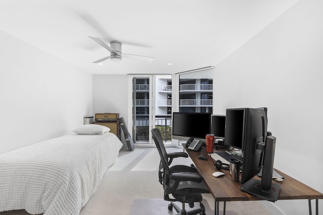 bedroom featuring ceiling fan and light colored carpet