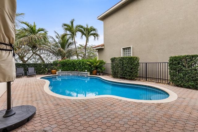 view of pool with a patio