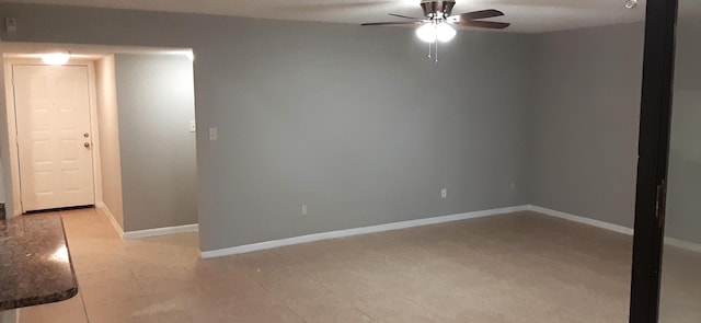 unfurnished room featuring ceiling fan