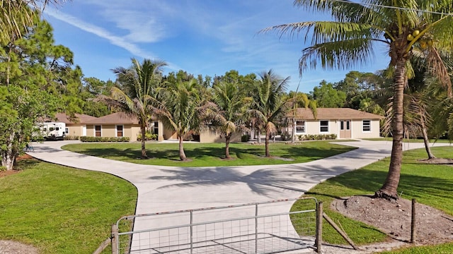 view of home's community featuring a yard