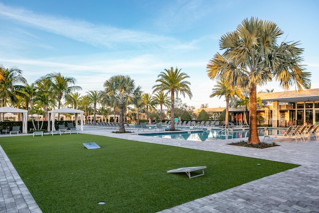 view of swimming pool with a gazebo, a patio area, and a yard