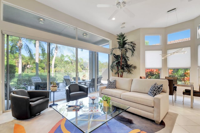 tiled living room with ceiling fan