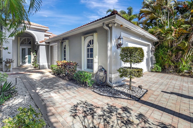 exterior space with a garage