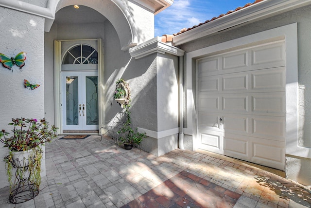 doorway to property featuring french doors