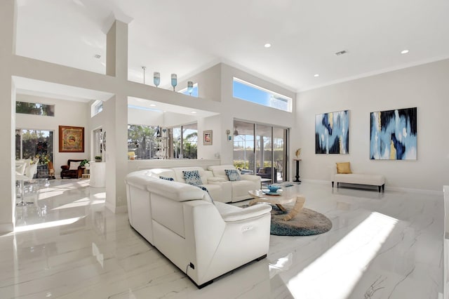 living room with a towering ceiling