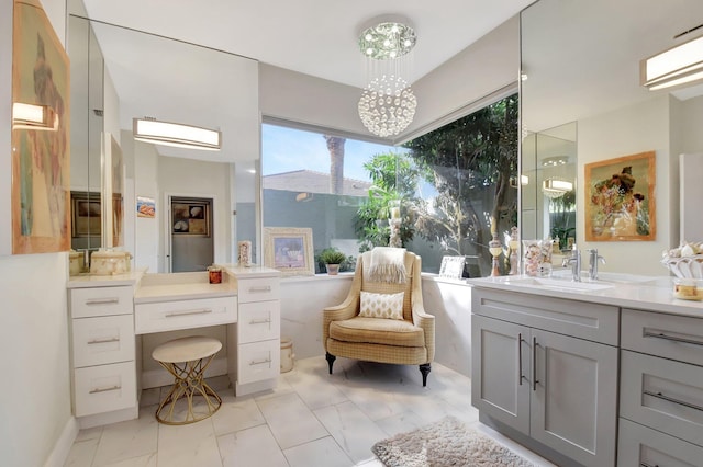 bathroom featuring vanity and an inviting chandelier