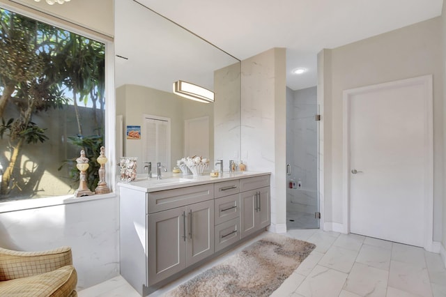 bathroom featuring vanity and walk in shower