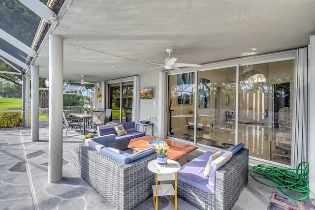 view of patio / terrace featuring an outdoor living space and ceiling fan