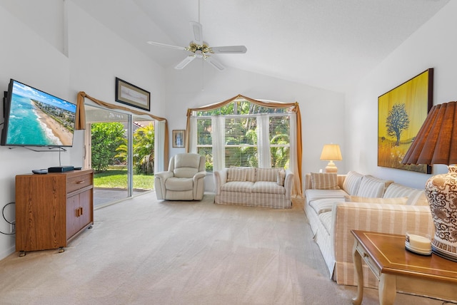 carpeted living room featuring ceiling fan and high vaulted ceiling