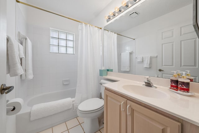 full bathroom featuring tile patterned flooring, vanity, toilet, and shower / tub combo with curtain