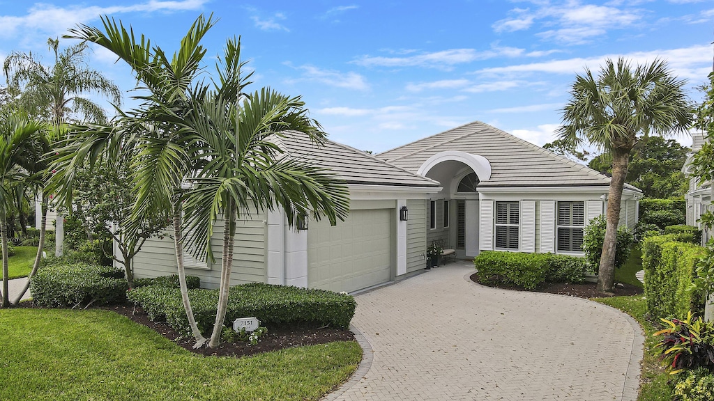 view of front of property with a garage