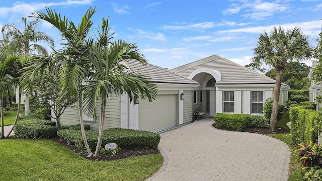 view of front of property with a garage