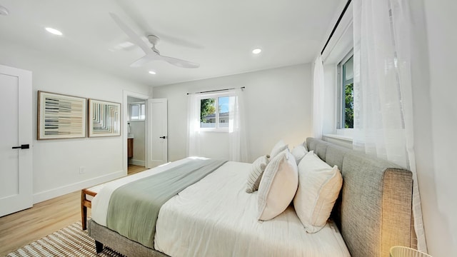 bedroom featuring ceiling fan and light wood-type flooring