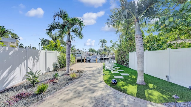 view of yard with a dock