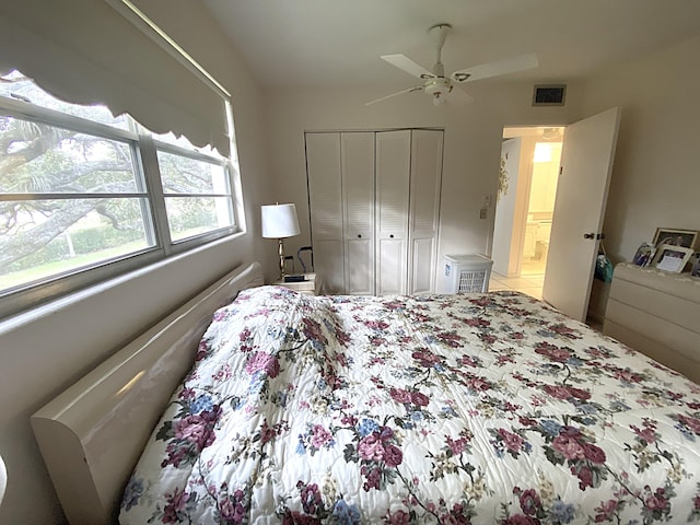 bedroom featuring a closet and ceiling fan