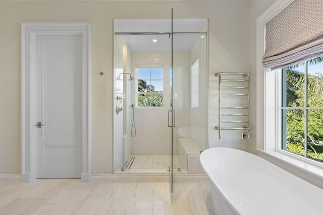 bathroom with separate shower and tub and radiator